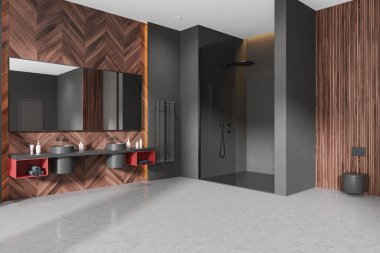 Karanlık ev banyosu manzarası çift lavabo ve cam duş, duvara asılmış tuvalet. Ahşap kaplama duvarlı ve gri beton zemini olan şık bir banyo alanı. 3B görüntüleme