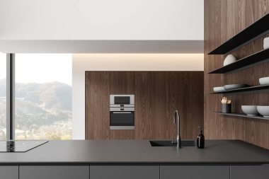 İçinde bar adası, lavabo ve elektrikli soba, raflarda tabak ve tabaklar olan karanlık ahşap bir ev mutfağı. Modern dairede panoramik pencereli yemek dolabı. 3B görüntüleme