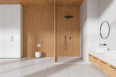Beyaz ve ahşap banyo içi cam duş, çift lavabo ve duvar asılmış tuvalet. Beton zeminde gardıroplu banyo alanı. 3B görüntüleme