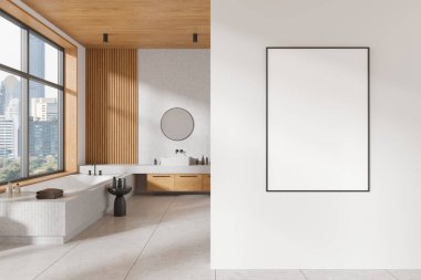 Küvetli, gösterişli ve duvarında boş bir çerçeve olan modern banyo. Minimalist tasarım, ahşap ve beyaz arka plan. İç tasarım kavramı. 3B görüntüleme