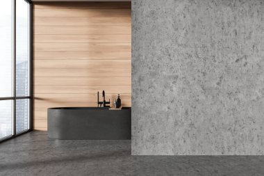 Siyah küveti ve beton zemini olan modern minimalist bir banyo. Geniş pencereli açık tahta bir duvar. Minimalist ev tasarımı kavramı. 3B görüntüleme.