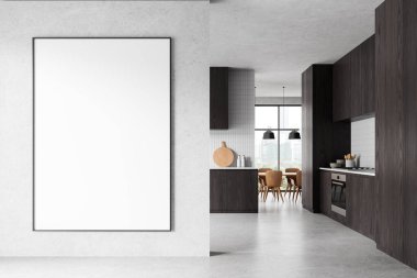 Karanlık dolapları olan modern minimalist mutfak, aydınlık bir duvarda boş beyaz resim çerçevesi. Temiz tasarım, hafif arka plan, ev içi konsept. 3B görüntüleme.