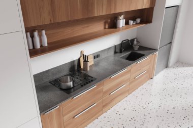 Mutfak manzarası ahşap mutfak dolabı, lavabo gaz sobası ve mutfak gereçleri. Modern apartmanın beton zemininde buzdolabı ve raflar. 3B görüntüleme