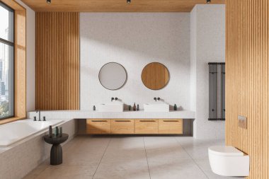 İki lavabosu, yuvarlak aynaları, küveti ve tahta paneli olan bir banyo. Işık ayarı, 3 boyutlu modern banyo tasarımı
