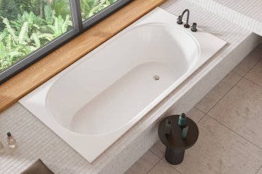 Beyaz küvetli, sehpalı, beton döşemeli zarif otel banyosu manzarası. Modern dairede banyo köşesi. Tropik bölgelerde panoramik pencere. 3B görüntüleme