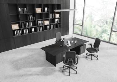 Siyahi çalışma masası, bilgisayar, aydınlık beton zemin. Danışmanlık yeri ve klasörlü raf. Tropik bölgelerde panoramik pencere. 3B görüntüleme