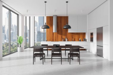 İçinde büyük bir ahşap yemek masası, siyah sandalyeler ve kolye ışıkları olan modern bir mutfak. Şehir manzarası geçmişi. 3B Hazırlama.