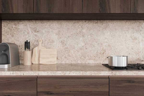 Beige home kitchen interior with sink and gas stove with pot, minimalist kitchenware. Cooking cabinet and stone counter with knives and coffee maker. 3D rendering