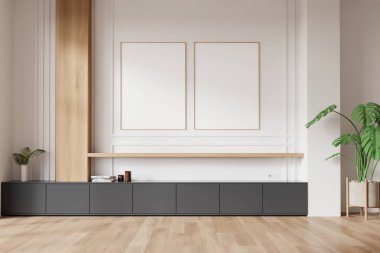 Siyah büfe ve sanat dekorasyonu olan şık bir oturma odası. Konforlu İskandinav çekmecesi tasarımı ve sıra sıra dizilmiş iki tuval poster. 3B görüntüleme