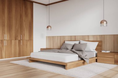 Otelin yatak odası manzarası. Podyumda yatak, çarşaf ve dekoratif komodin, ahşap zeminde halı. Ahşap gardıropla rahatlatıcı bir köşe. 3B görüntüleme