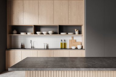 Ahşap ve gri ev yapımı mutfak içi bar adası boş taş tezgahı, ahşap dolap. Lavabo, elektrikli soba ve mutfak malzemeleri. Şık bir dairede yemek pişirme yeri. 3B görüntüleme