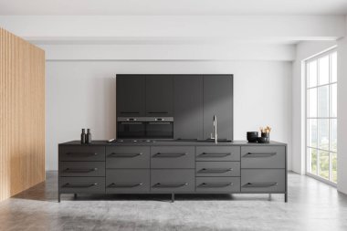 Minimalist tasarım unsurları olan gösterişli karanlık dolaplar içeren modern bir mutfak. Geniş pencereli beyaz arka plana karşı kurulmuş, çağdaş bir iç mekan sergileniyor. 3B Hazırlama