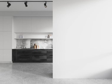 Dolapları ve tezgahları olan modern mutfak, boş beyaz bir duvarın yanında, taklit amaçlar için geniş bir kopya alanı sağlıyor. 3B Hazırlama