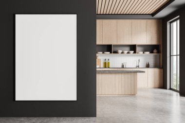 Ahşap dolaplar ve beton zemin içeren, ev tasarımı kavramlarını ön plana çıkaran, modern mutfak içindeki karanlık bir duvarda boş bir poster şablonu. 3B Hazırlama