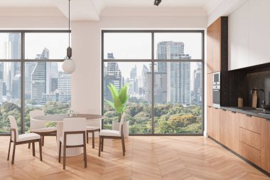 İçinde ahşap dolaplar, sandalyeli bir yemek masası ve şehrin manzarasını gösteren büyük pencereler olan modern bir mutfak. Açık ahşap döşeme, parlak ve havadar bir ortam. 3B Hazırlama