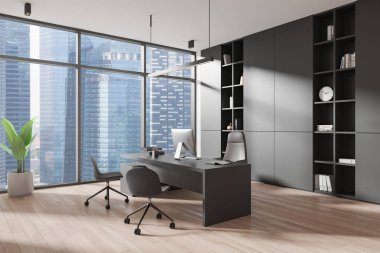 Ofisin karanlık kısmının köşesinde masa başında bilgisayar, yerde koltuklar var. Dekorasyonlu Ceo modern danışmanlık çalışma alanı. Gökdelenlerin panoramik penceresi. 3B görüntüleme