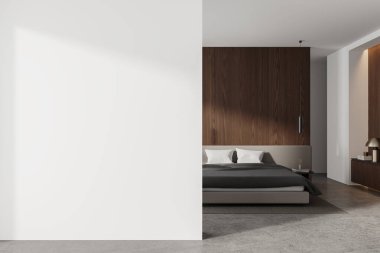 Modern otel odası iç yatağı keten kaplı, halı beton zemin üzerinde. Çekmecesi ve dekorasyonu olan rahat bir uyku odası. Boşluk duvarını kopyala. 3B görüntüleme