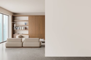 Fotokopi alanı için boş duvarı olan geniş, modern bir oturma odası. Minimalist mobilyalar ve içi kitaplarla dolu ahşap raflar. İç tasarım kavramı. 3B Hazırlama