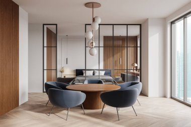 Klasik ev içi yuvarlak yemek masası ve sandalyeler, cam bölmenin arkasındaki yatak odası. Sandalyeli yatak ve iş yeri. Şehrin gökdelenlerinin panoramik penceresi. 3B görüntüleme