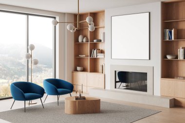 İçinde iki mavi sandalye, bir ahşap sehpa ve duvar rafları olan modern oturma odası. Şöminenin üzerinde boş bir poster sergileniyor. İçerisi rahat ve şık. 3B Hazırlama