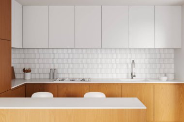 Beyaz ve ahşap ev yapımı mutfak dolabı olan bir bar adası. Lavabo, gaz ocağı ve mutfak gereçleri. Şık bir dairede lüks yemek pişirme alanı tasarımı. 3B görüntüleme