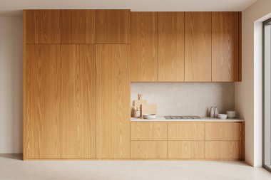 Ahşap dolaplar ve minimalist tasarım ile modern mutfak. Gösterişli dolabın altını çizen ışık arka plan. Çağdaş ev hayatı kavramı. 3B Hazırlama