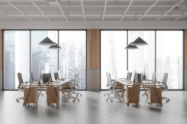 Geniş pencereleri, parlak mobilyaları ve beton zemini olan modern bir açık uzay ofisi. Oda aydınlık ve aydınlık, çağdaş bir iş ortamı sergiliyor. 3B Hazırlama