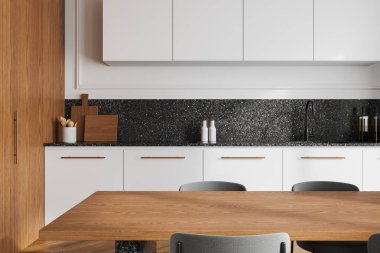 İçinde beyaz dolaplar, ahşap aksanlar ve benekli bir tezgah olan modern mutfak. Yemek masası ve sandalyeler ön planda. Ev tasarımı kavramı. 3B Hazırlama