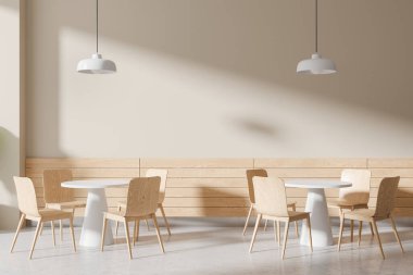 İçi aydınlık ve ahşap restoranlarda sandalyeler, yuvarlak masalar, beton zemin. Minimalist mobilyaları ve lambaları olan rahat bir kafe. 3B görüntüleme