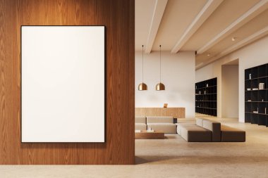 Resepsiyon masası ve dizüstü bilgisayarı olan rahat bir lobi iç modüler kanepesi. Kitapları ve süslemeleri olan raflar. Bej ofis ya da salon bekleme yeri. Ahşap duvar bölmesindeki tuval posteri. 3B görüntüleme