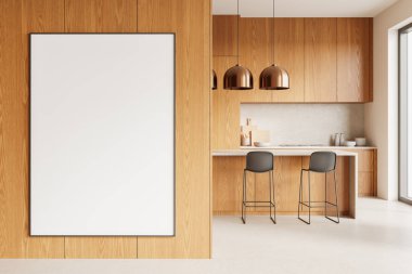 Modern bir mutfakta ahşap bir duvarda büyük boş bir poster, ahşap dolaplar, bar tabureleri ve kolye ışıkları. İç tasarım ve dekorasyon kavramı. 3B Hazırlama