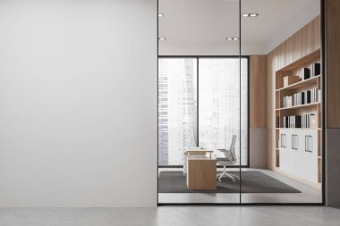 İçinde boş beyaz bir duvar ve sandalye ve bilgisayar olan bir masa düzeneği olan modern bir ofis. Yaratıcılık ve üretkenlik için alan. 3B Hazırlama