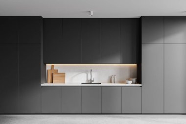 Gri mutfak iç mimarisi, lavabo ve mutfak malzemeleri, beton zeminde gizli raflar. Lüks yemek odası, modern dairedeki dolap. 3B görüntüleme