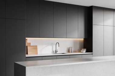 Modern mutfak, parlak gri dolaplar ve minimalist tasarım. Pürüzsüz yüzeyler ve yumuşak ışıklandırma çağdaş bir ortam yaratır. 3B Hazırlama