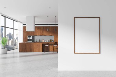Çerçevelenmiş bir modeli olan boş bir duvarın yer aldığı modern bir mutfak. Beton zeminde temiz bir tasarım. Minimalist dekor kavramı. 3B Hazırlama