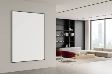 Modern bir oturma odasında asgari dekor ve doğal ışıkla sergilenen boş bir poster. 3B Hazırlama