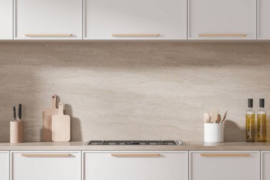 Minimalist mutfak tezgahı ahşap kaplar, kesme tahtaları, bıçak seti ve bej taştan bir duvara karşı pişirme yağları, modern sadelik. 3B Hazırlama.