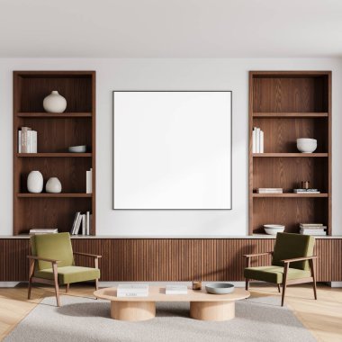 Modern bir oturma odasındaki beyaz bir duvara boş bir poster modeli, ahşap raflar, yeşil sandalyeler ve bir sehpa. Duvar dekoru kavramı. 3B Hazırlama