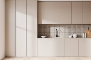 Açık bej ev yapımı mutfak iç mutfak dolabı ve raflar gizli. Mutfak gereçleri ve ahşap zemini olan modern bir dairede yemek pişirme alanı. 3B görüntüleme