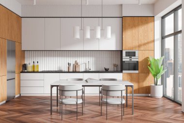 Ahşap dolapları, beyaz tezgahları ve yemek masası olan modern bir mutfak. Büyük pencereler şehir manzarası sağlar. Temiz ev konsepti. 3B Hazırlama.