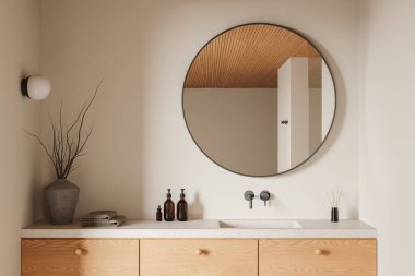 Yuvarlak aynalı minimalist banyo, ahşap kibir ve parlak eşyalar. Sıcak ışıklar, nötr tonlar. Modern iç tasarım. 3B Hazırlama