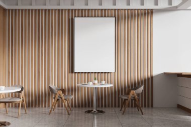 Sandalye ve masa ile süslü bir kafede ahşap bir duvarda boş bir poster. Modern iç mekan konsepti. 3B Hazırlama