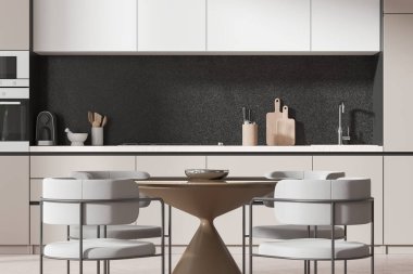 Zarif sandalyeler, yuvarlak bir masa, gösterişli dolaplar ve koyu bir arka plan içeren modern bir mutfak. Minimalist ve şık ev tasarımı. 3B Hazırlama
