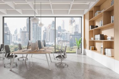 Geniş, modern ofis içi geniş pencereleri, minimalist bir tasarımı ve şehrin ufuk çizgisi arka planı var. Ortak çalışma alanı kavramı. 3B Hazırlama