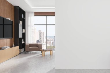Şık bir oturma odası koltuğu, kahve masası ve raflı ve dekorasyonlu bir televizyon ekranı. Gökdelenlerde panoramik pencereli dinlenme alanı. Boş duvar bölmesini düzenle. 3B görüntüleme