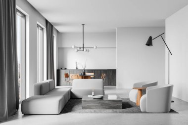 Gri koltukları, kahve masası ve arka planda ahşap aksanlı açık mutfağı olan çağdaş bir oturma odası. Minimalist beyaz iç mekan konsepti. 3B Hazırlama.