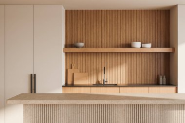 Ahşap panelli duvarları, aydınlık tezgahı ve minimalist dolabı olan gösterişli bir mutfak. Tarafsız bir arkaplan. Modern tasarım kavramı. 3B Hazırlama