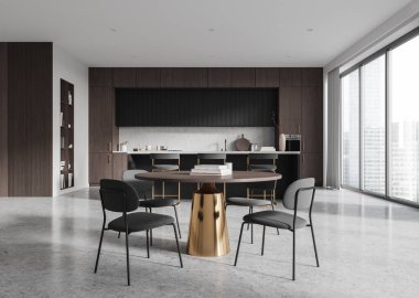 Karanlık ahşap dolapları, yuvarlak masaları ve sandalyeleri olan modern bir mutfak. Geniş pencereli ve parlak şehir manzaralı bir açık plan. Modern tasarım konsepti. 3B Hazırlama.