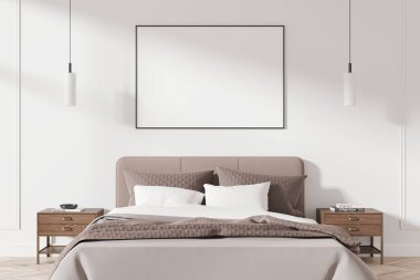 Yatağın üstünde bej yatak örtüsü, ahşap komodinleri ve minimalist yatak odası duvarına dayanan kolye ışıkları olan boş bir poster modeli. 3B Hazırlama