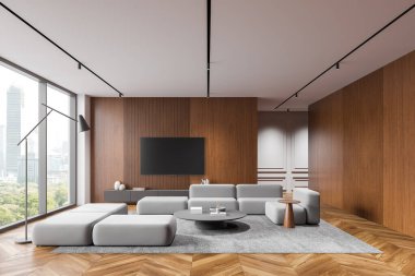 Parlak gri mobilyaların, ahşap duvar panellerinin ve şehir manzaralı büyük pencerelerin olduğu modern bir oturma odası tasarımı. Uzay minimalist zarafet ve açıklığı somutlaştırarak modern bir ev içi konsept yaratıyor. 3B Hazırlama